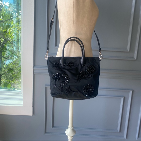 Prada Handbags - Prada Tessuto Ricamo bag with saffiano leather handles and cross body strap.